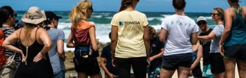 TOMRA employees collecting waste on beaches